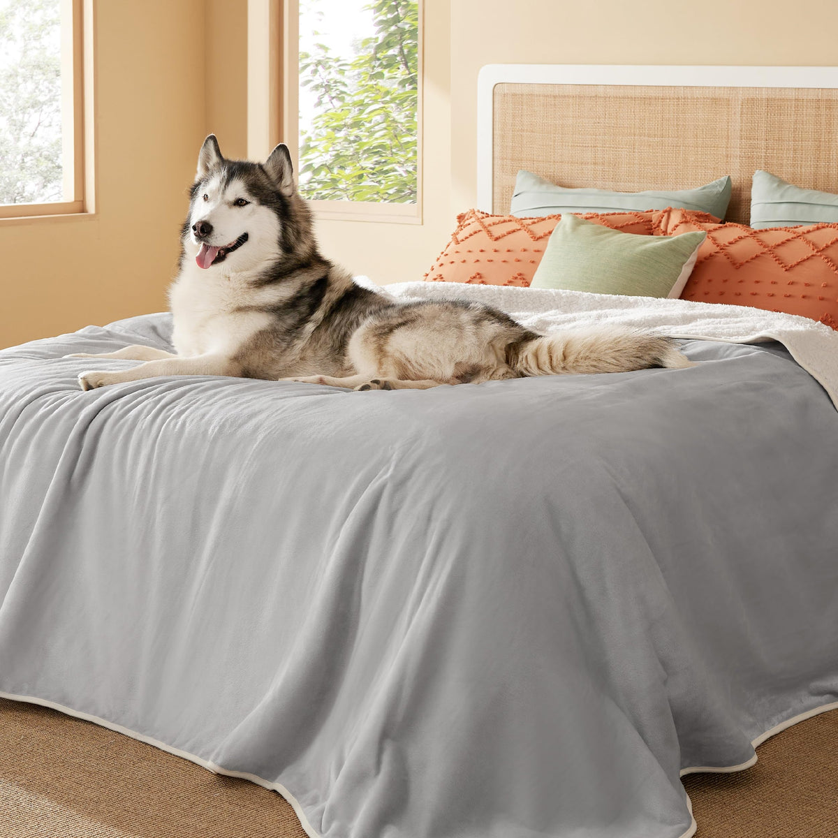 Bedsure waterproof blanket on bed with Sherpa side for cozy warmth and protection.