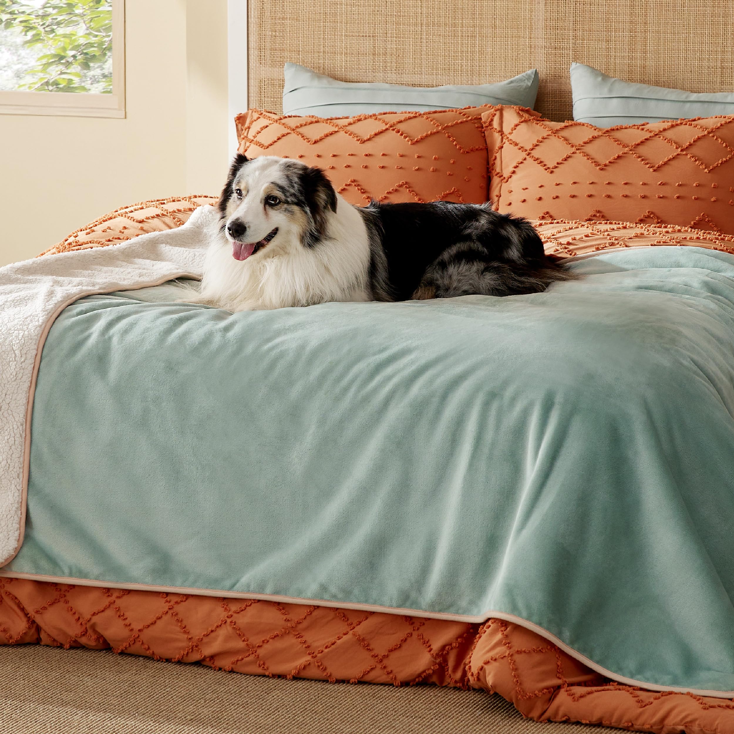 Bedsure waterproof blanket on bed with Sherpa warmth protecting against spills.