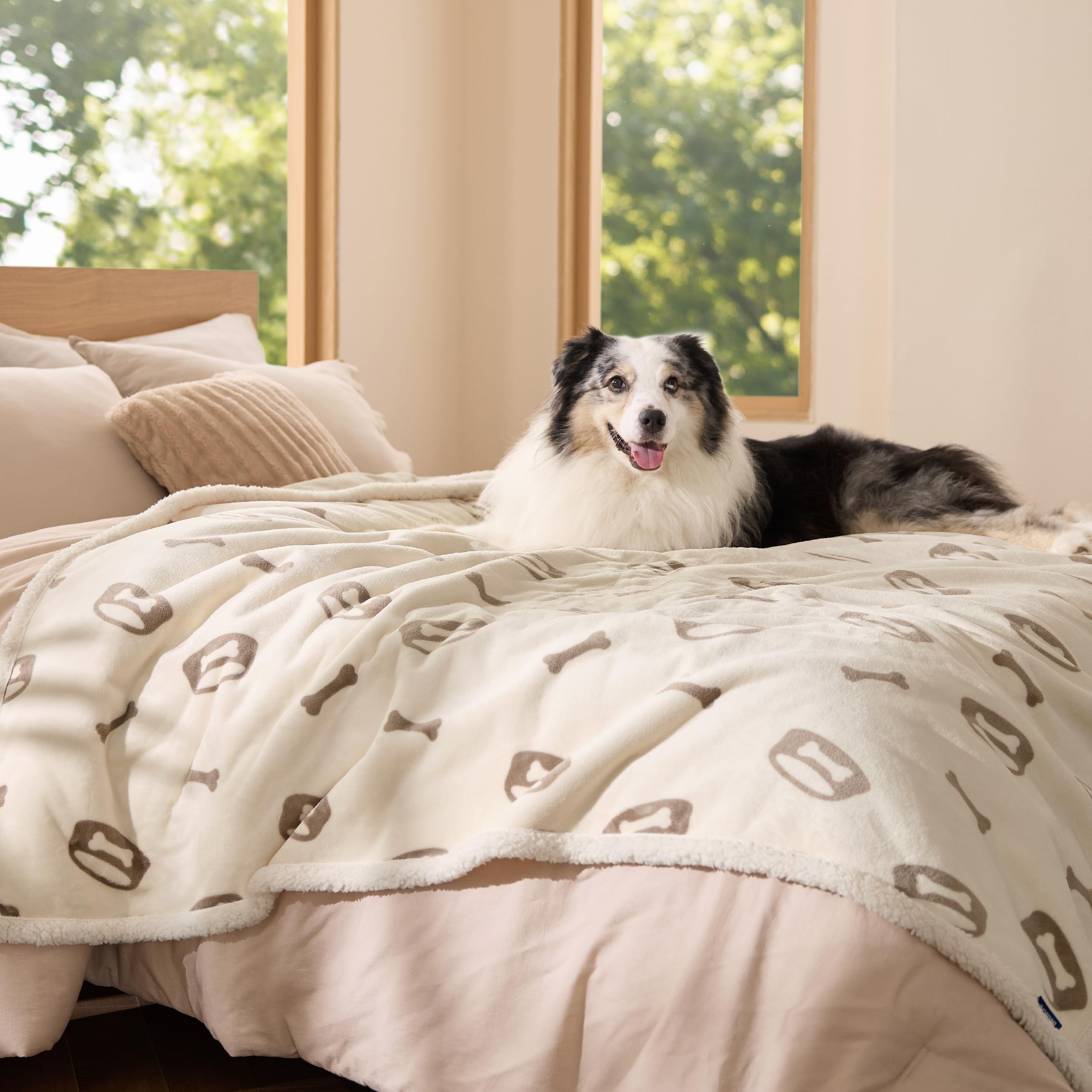 Bedsure waterproof sherpa blanket, front view, shields sofa from spills and paws