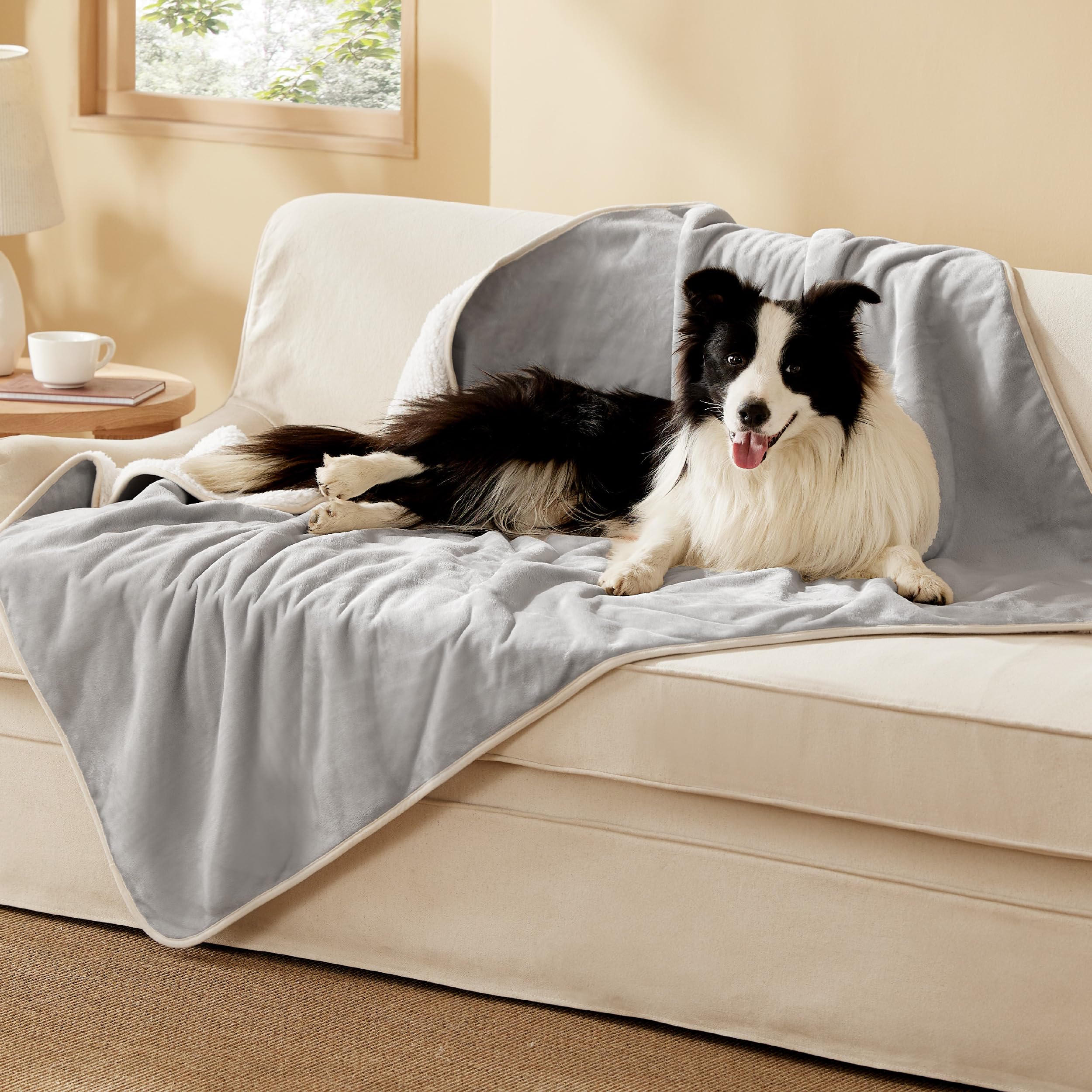 Bedsure waterproof dog blanket with Sherpa side for warmth and spill protection.