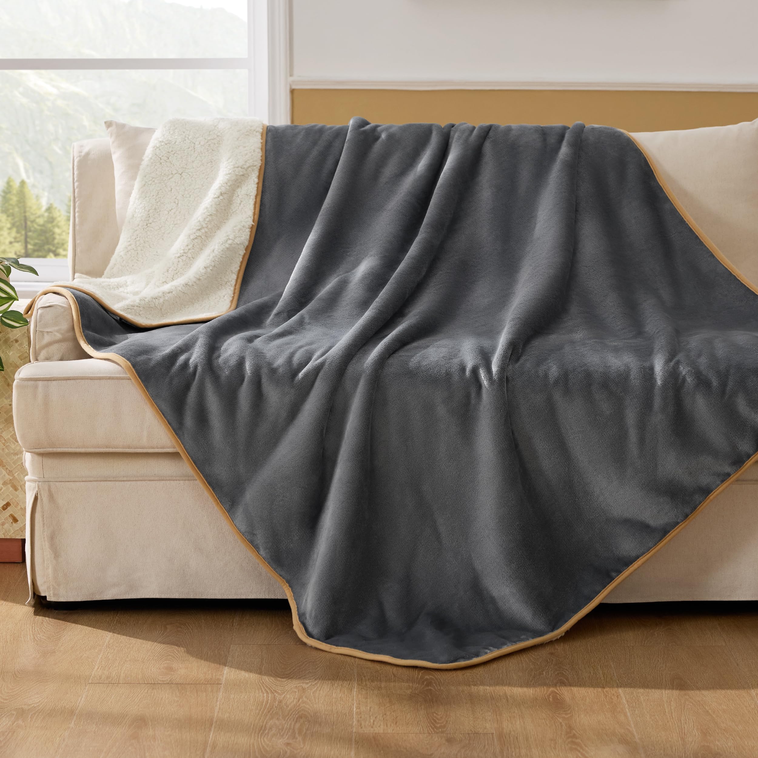 Bedsure waterproof dog blanket XL grey on sofa protects furniture from spills.