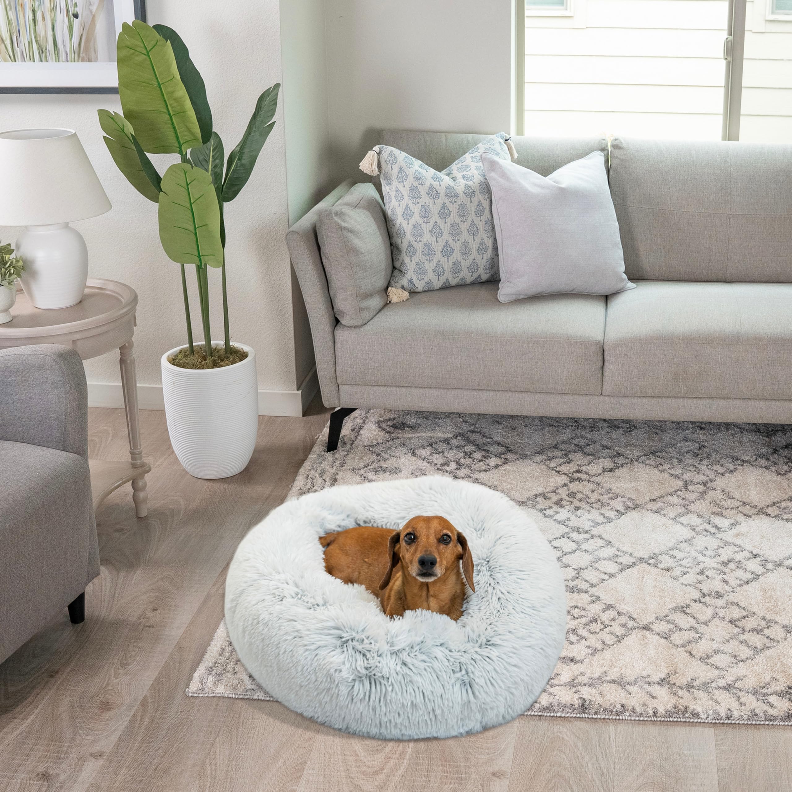 Best Friends by Sheri shag style fur bed creates a cozy winter sanctuary.