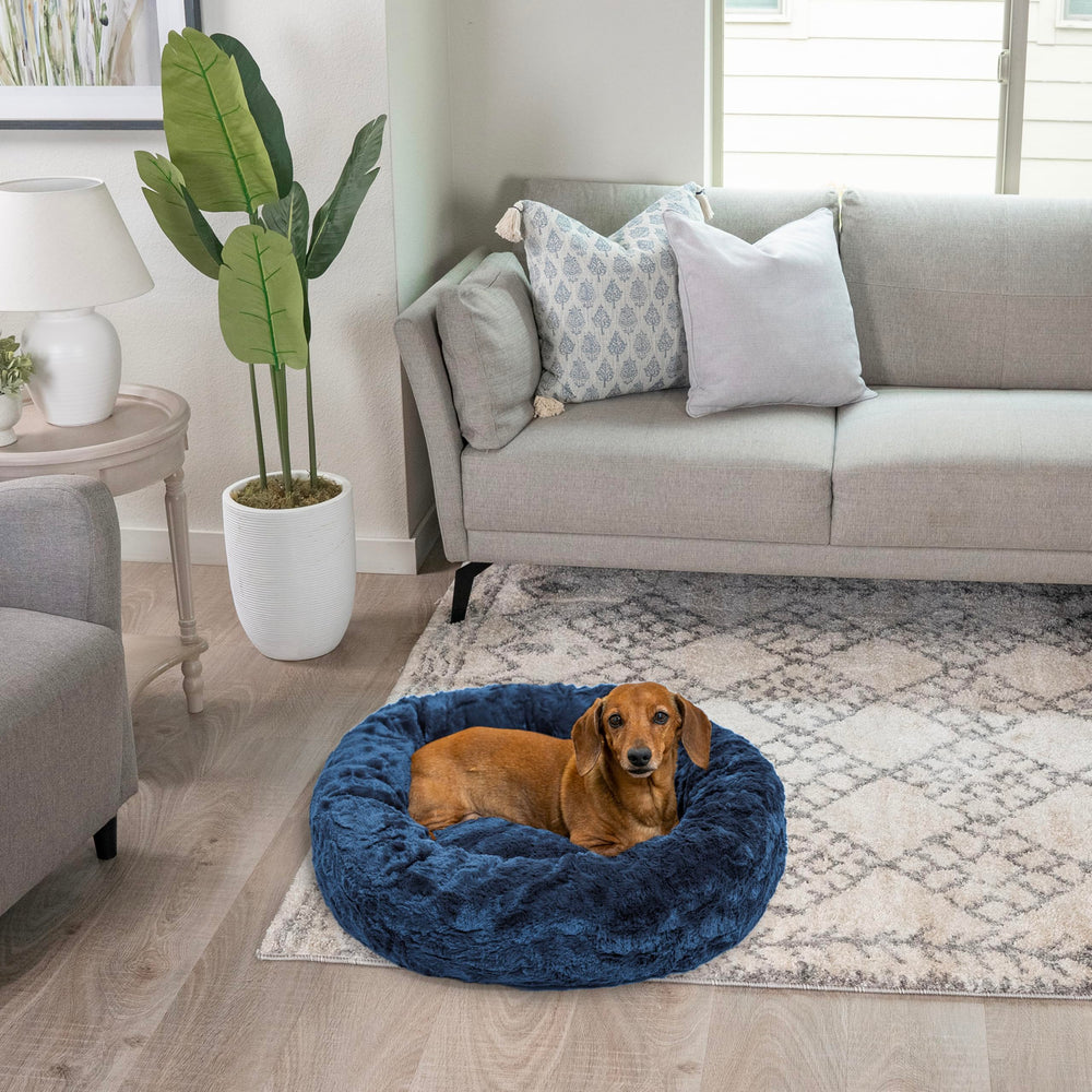 Best Friends by Sheri navy bed placed in a cozy nap spot at home.