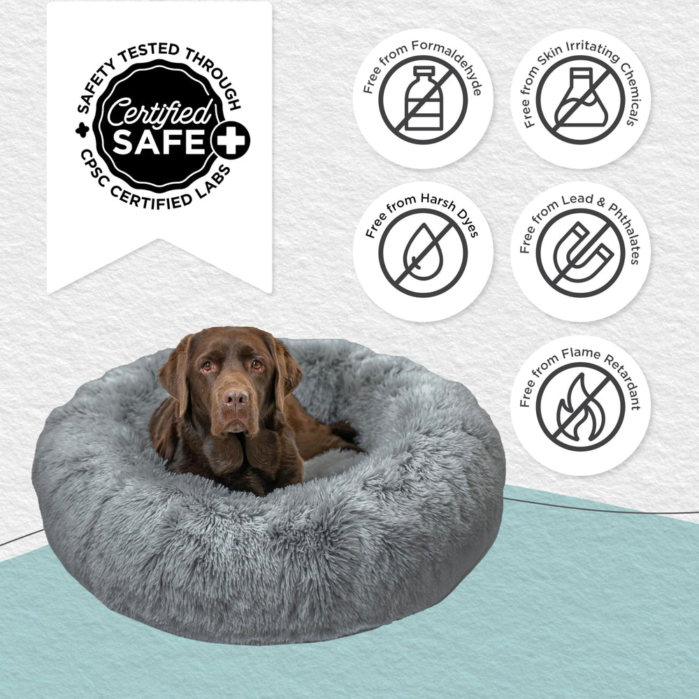 Best Friends by Sheri Donut Bed raised-edge bolsters cradle the body.