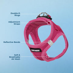 Fuchsia Voyager harness close-up showing secure hook-and-loop fastener for quick fitting