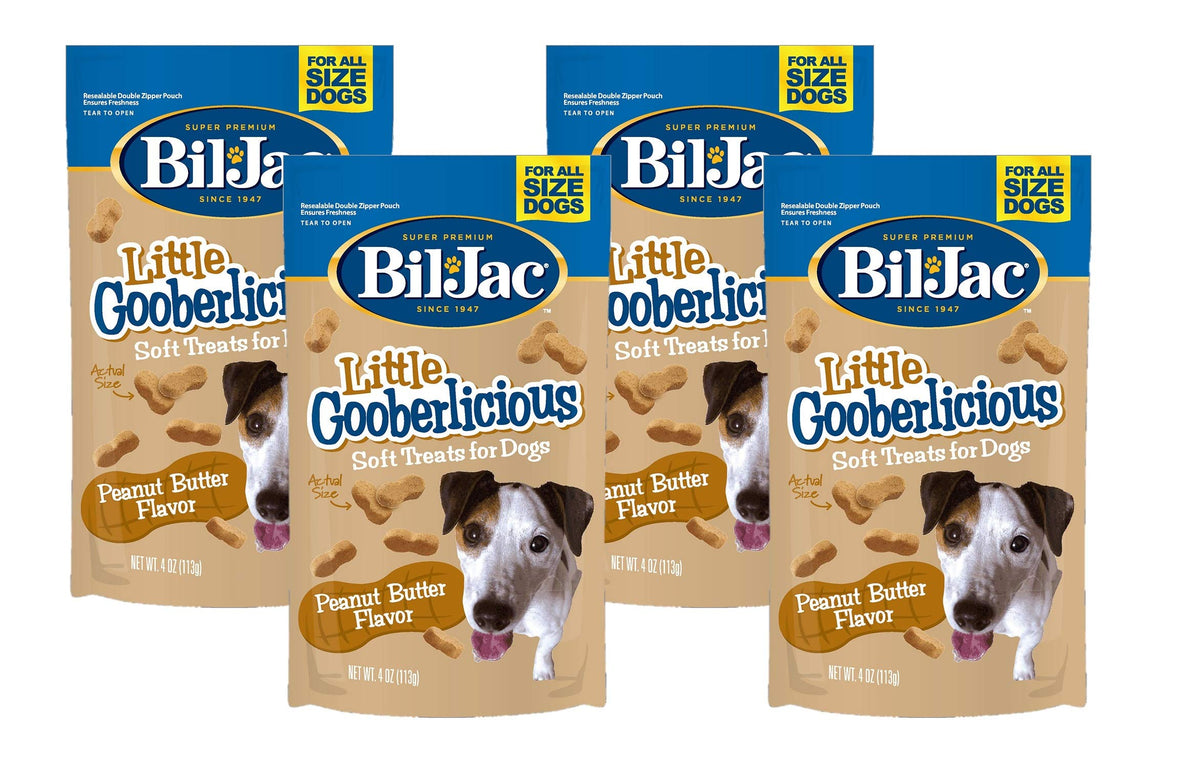 Bil-Jac Little Gooberlicious peanut butter treats held for training rewards.