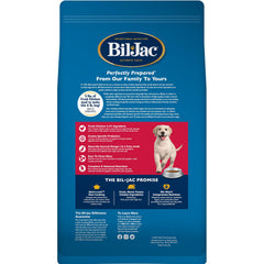 Bil-Jac Puppy Select kibble close-up shows real chicken for sturdy puppy energy