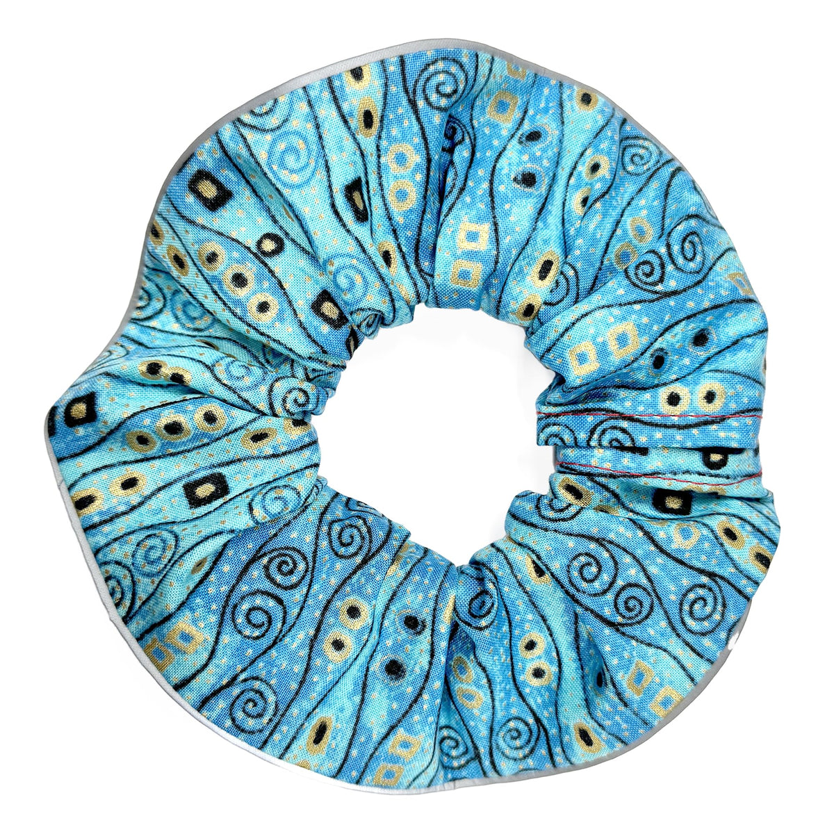 Birdsbesafe Bejeweled Stripes collar cover on a calm cat increases bird visibility.