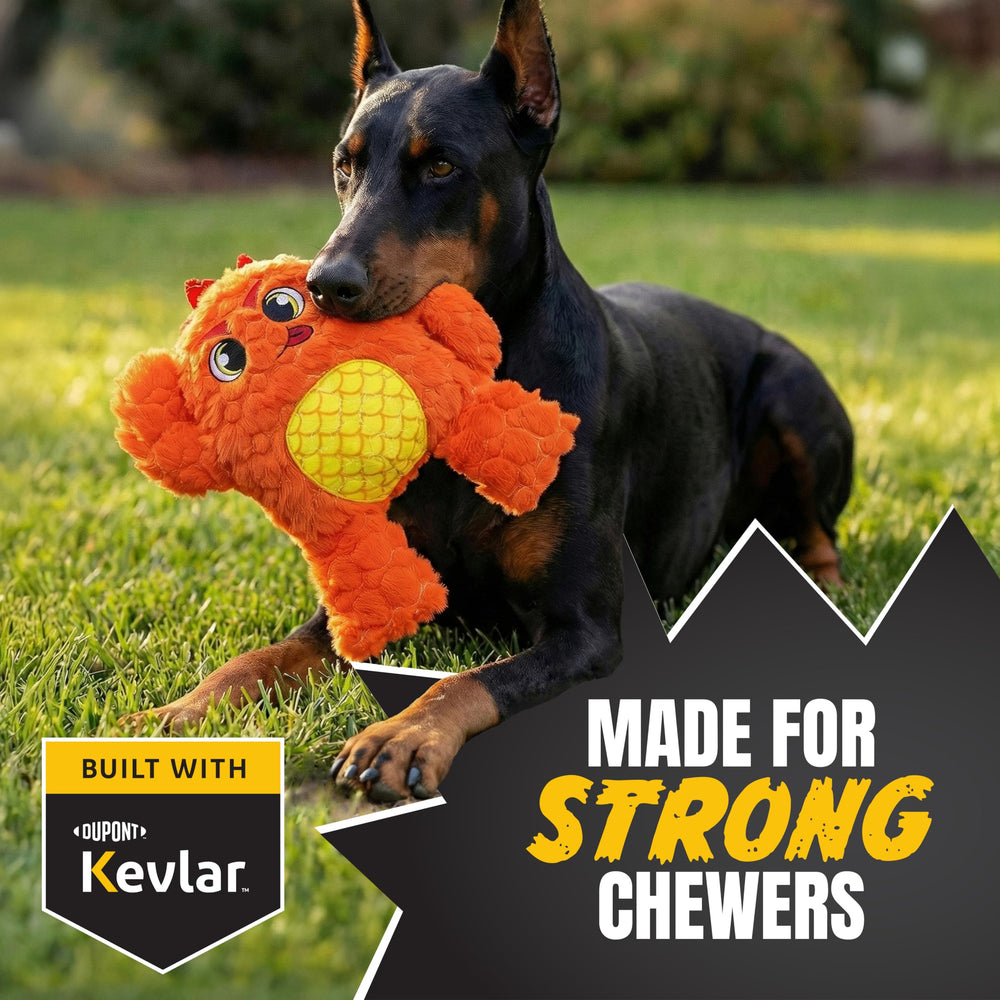 Bite Force orange monster dog toy with squeaker enhances interactive play indoors.