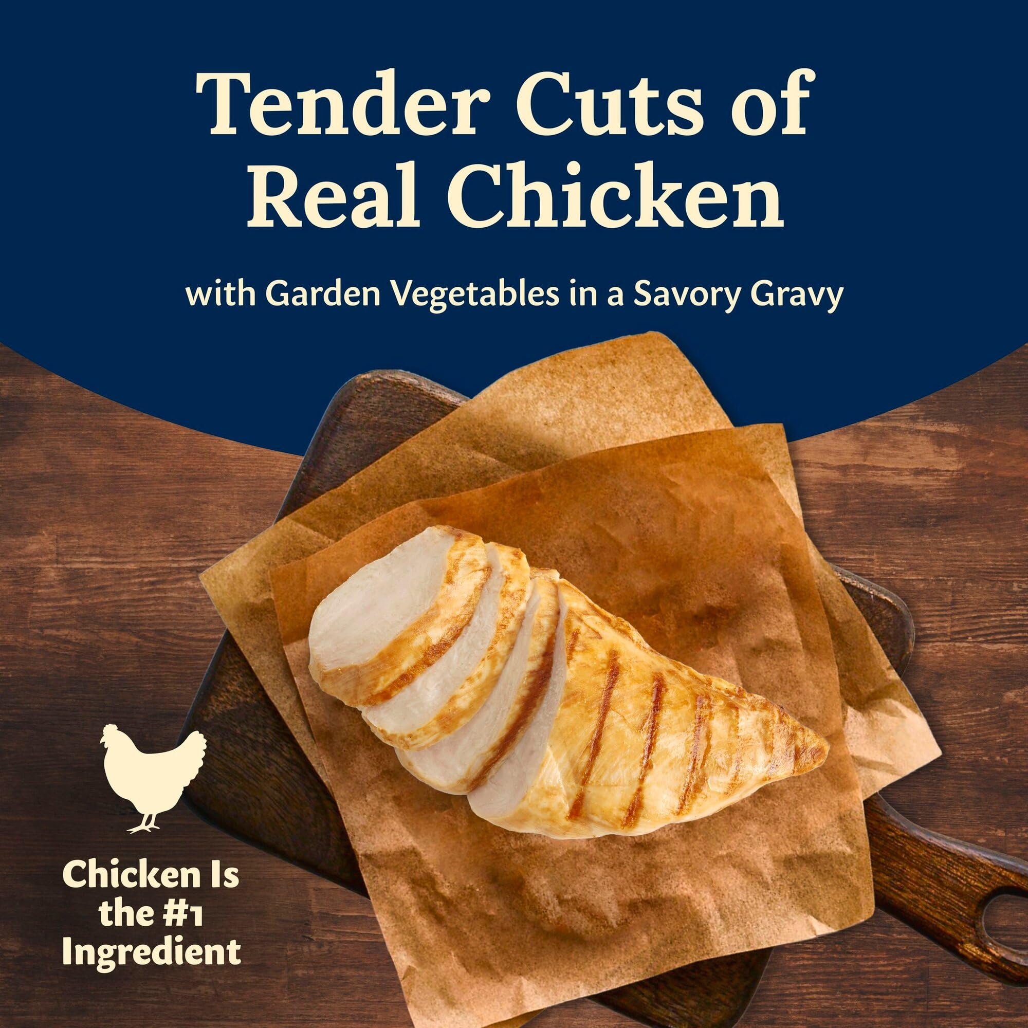 Blue Buffalo Delectables chicken in gravy close-up highlights tender meat in sauce.