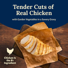 Blue Buffalo Delectables chicken in gravy close-up highlights tender meat in sauce.