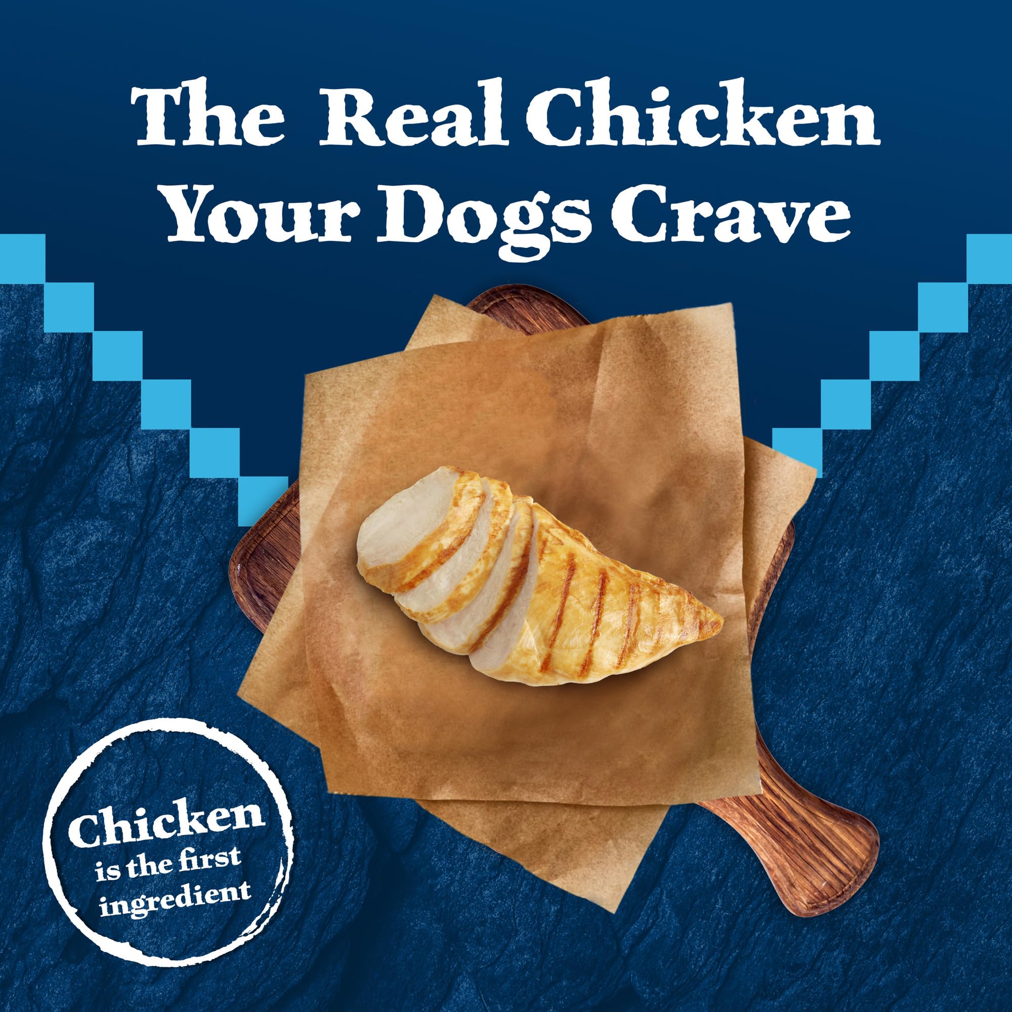 Blue Buffalo Wilderness chicken recipe ingredient chunks emphasize protein-rich nutrition.