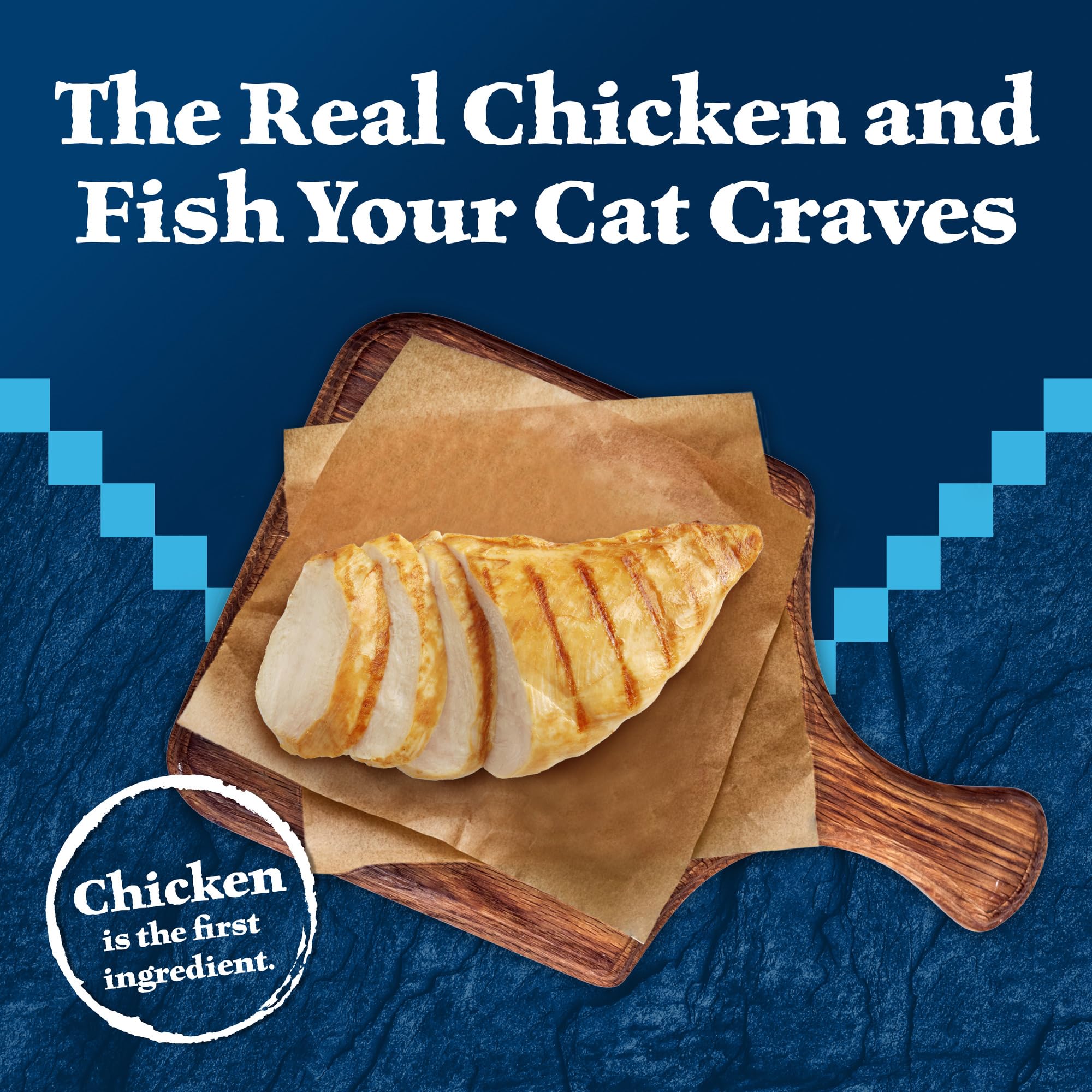 Blue Buffalo Wilderness flaked chicken-trout close-up emphasizes meat-forward recipe.