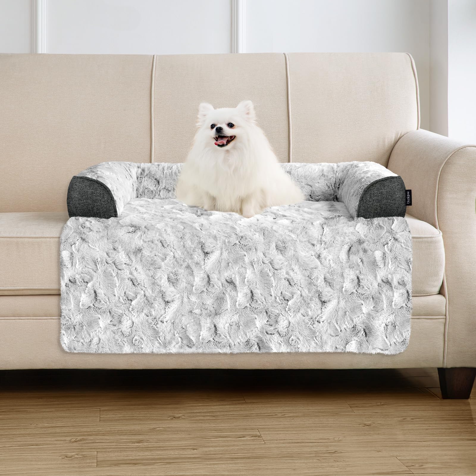 blunique calming dog bed on couch with plush faux fur for comfort.