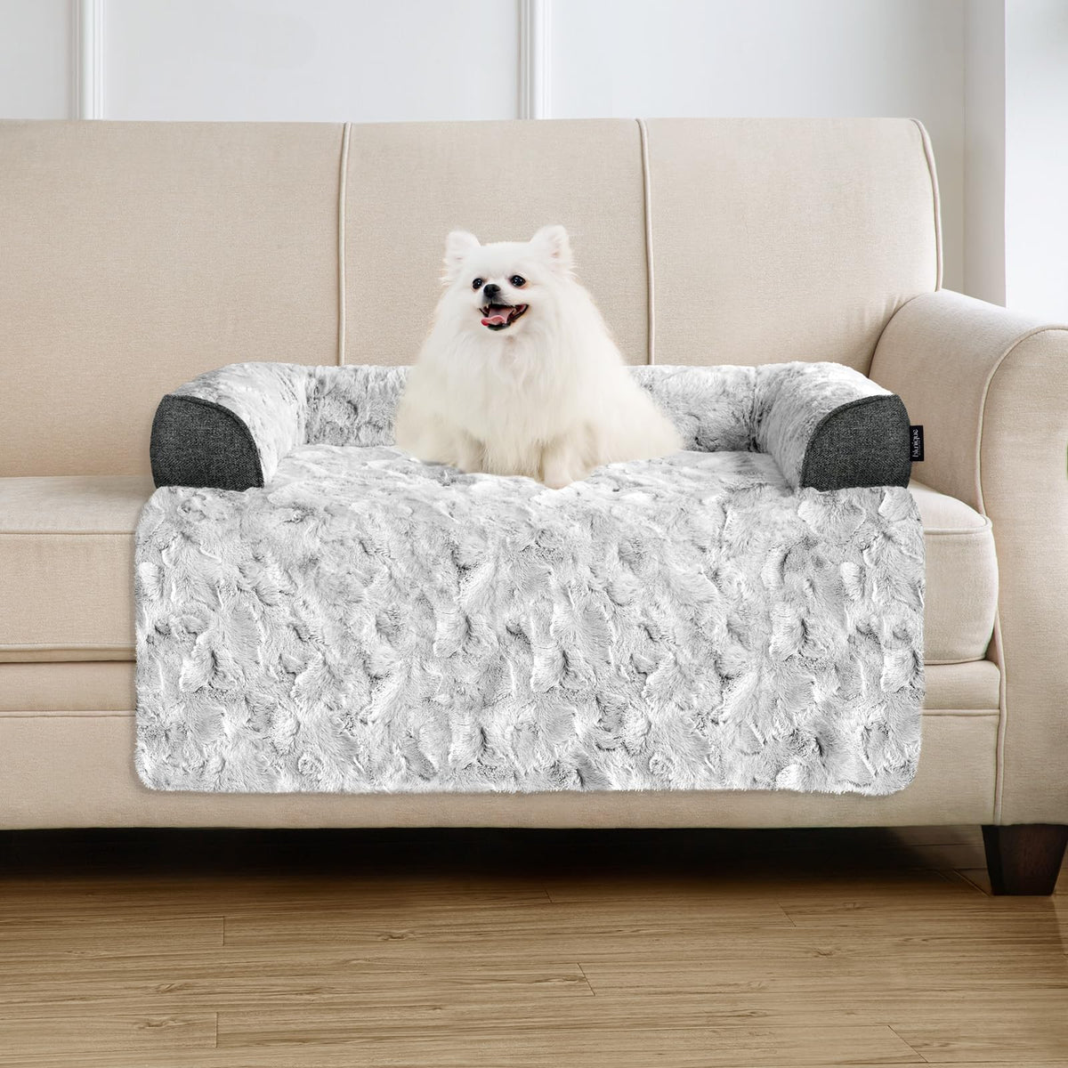 blunique calming dog bed on couch with plush faux fur for comfort.