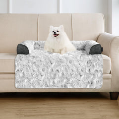 blunique calming dog bed on couch with plush faux fur for comfort.