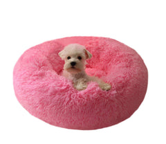 BODISEINT modern soft plush round pet bed with hot pink donut design provides cozy warmth for small pets.