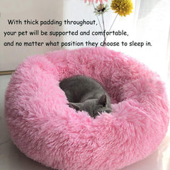 BODISEINT round pet bed hot pink features a non-slip bottom to stay put on hard floors.