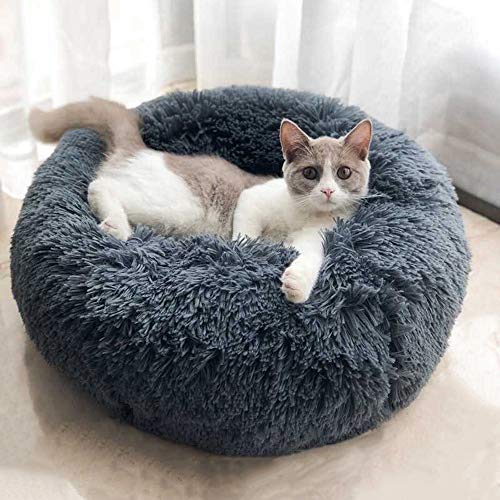 BODISEINT round pet bed with self-warming fleece for added warmth.