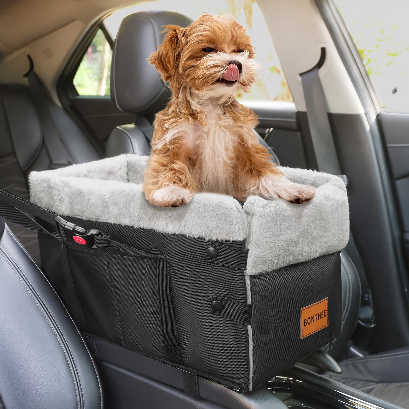 Bonthee center-console dog seat installed in car for secure travel and clear driver view.