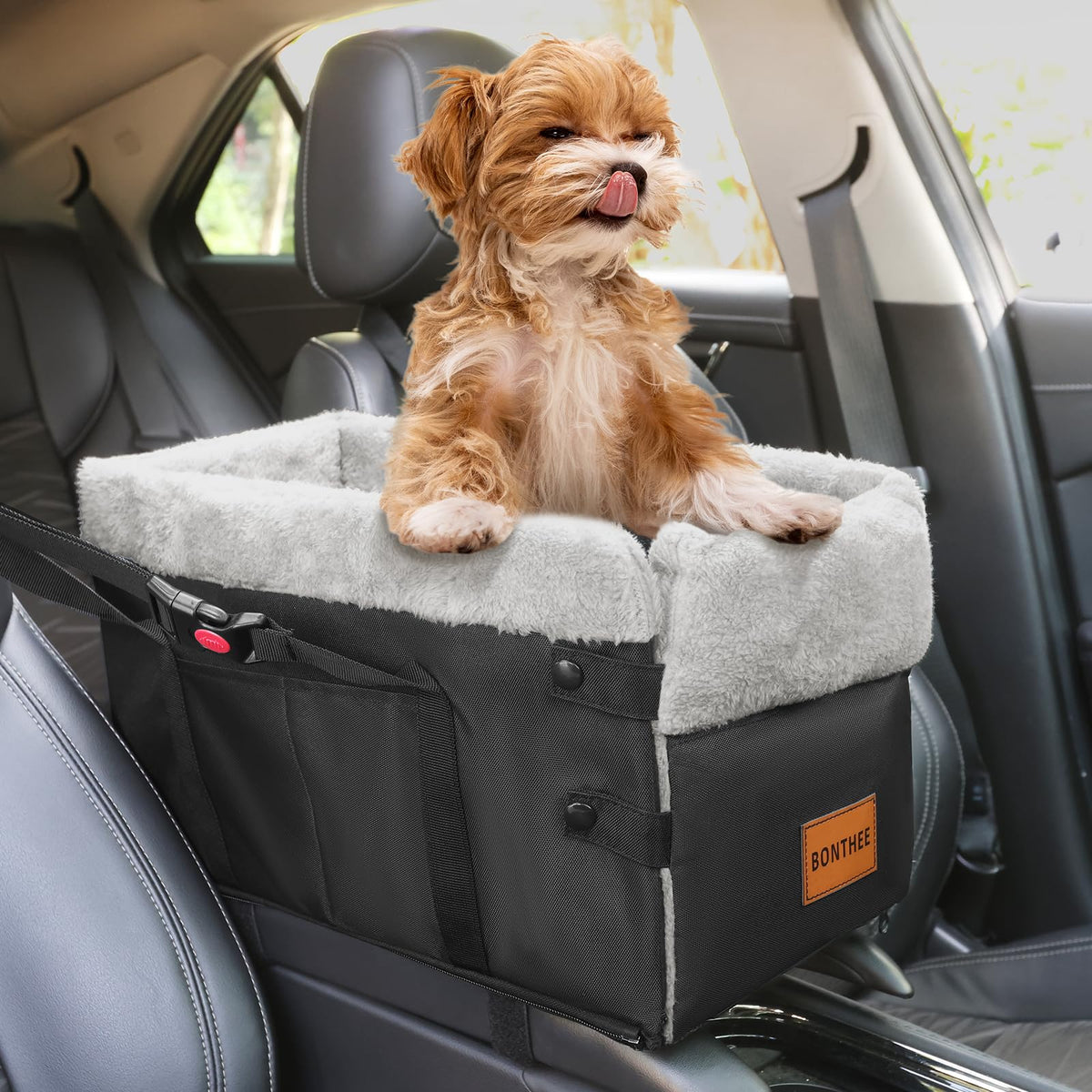 Bonthee center-console dog seat installed in car for secure travel and clear driver view.