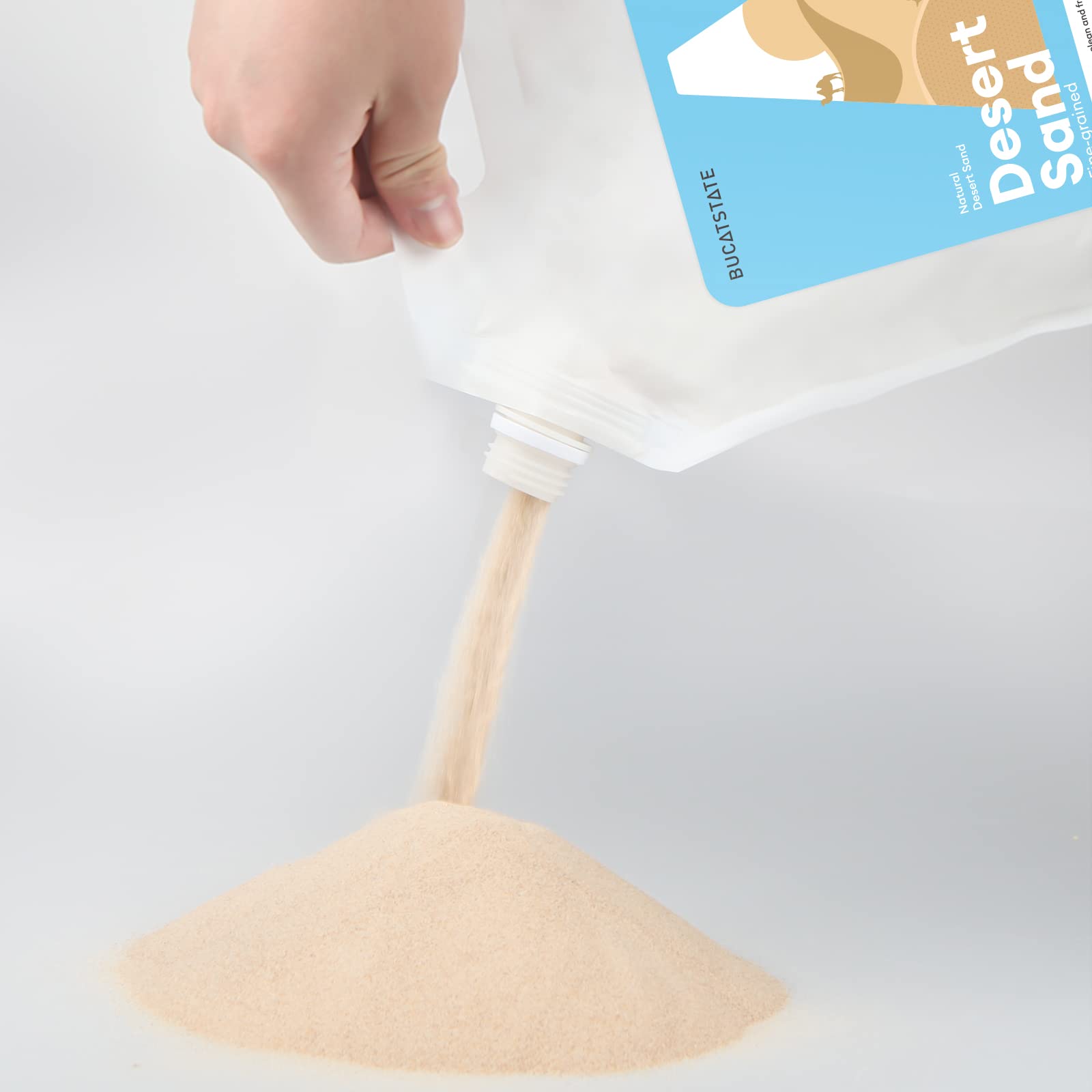 BUCATSTATE sand helps control moisture and odors in a tidy cage.