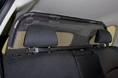 Bushwhacker cargo barrier frame side view demonstrates sturdy lightweight construction for secure restraint.