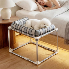 Caghash bedside cosleeper overview shows a cozy companion space for pets beside the bed.