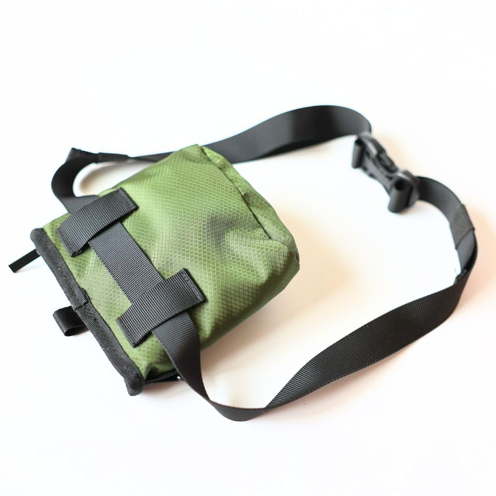 Callieco mini dog treat pouch with D-ring attachment keeps essentials handy.