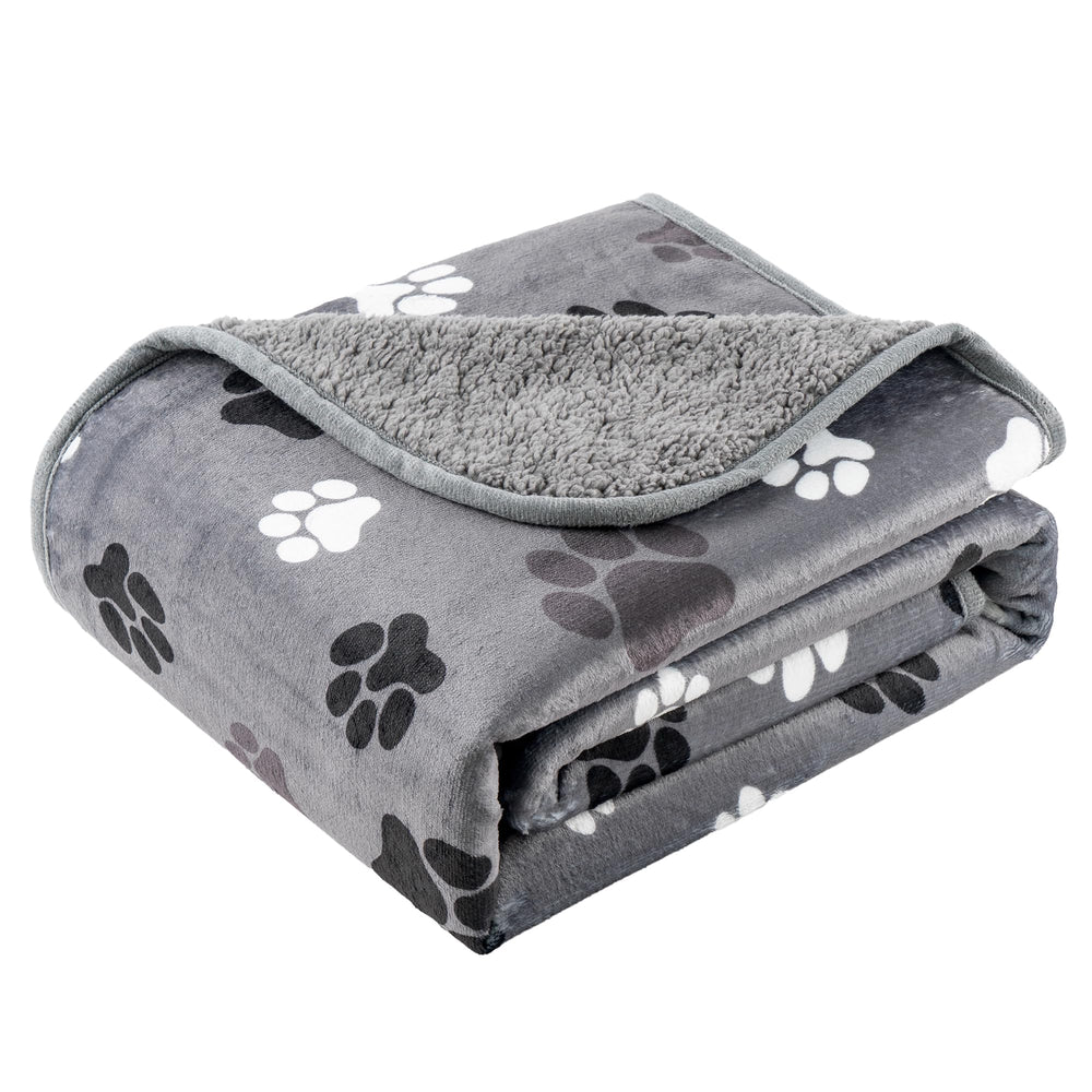 CAPT.SNOOZE waterproof blanket on sofa protects furniture and keeps pets comfy.