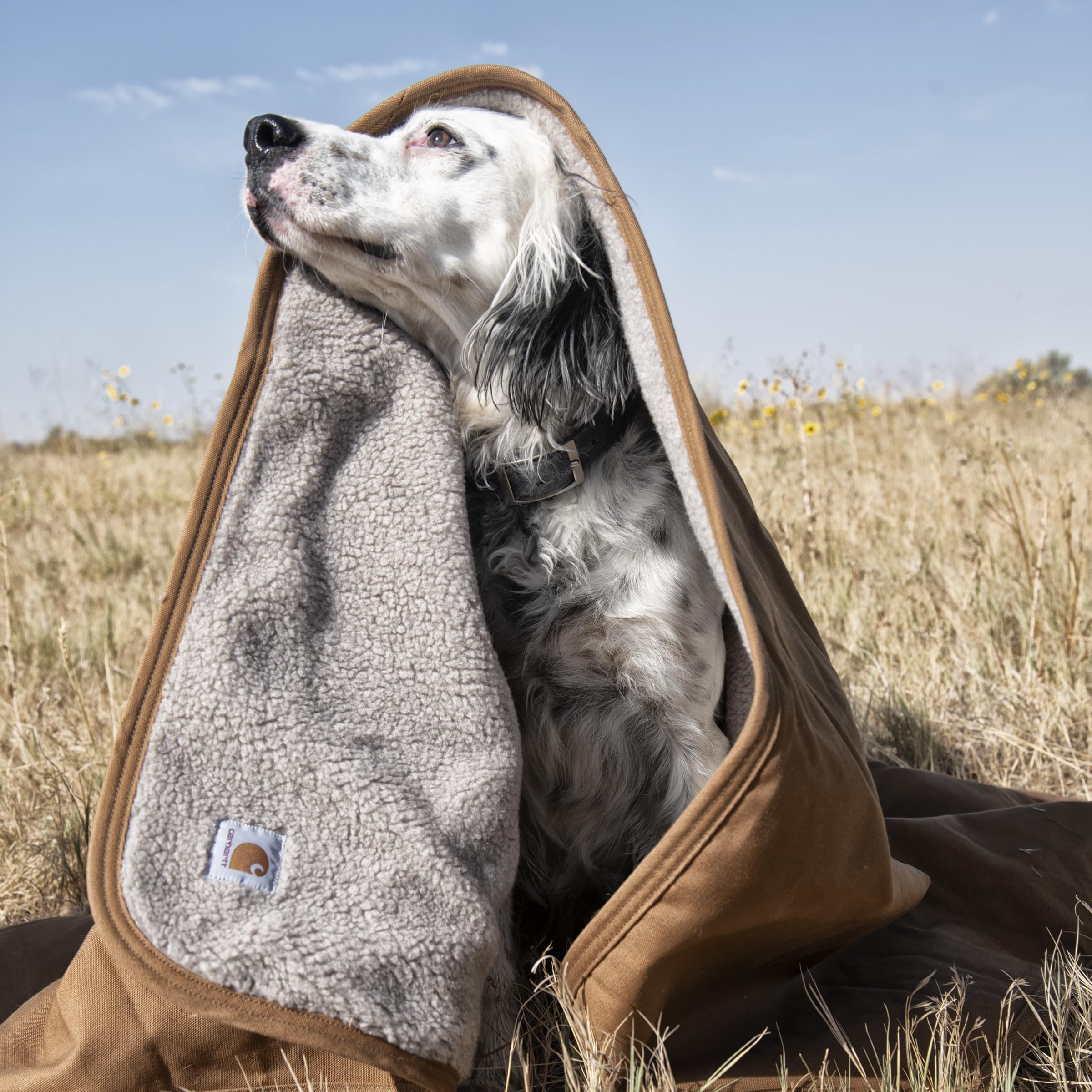 Carhartt Firm Duck Sherpa-Lined Blanket with reinforced edges enduring daily use.