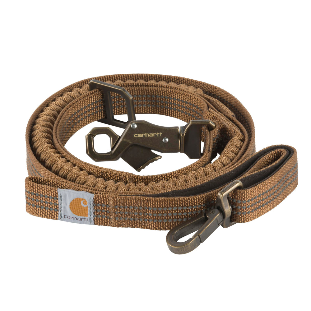 Carhartt shock-absorbing control leash in use, easing jolts during training sessions.