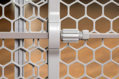 Carlson Easy Fit Dog Gate step-over height supports adults while safely containing pets.