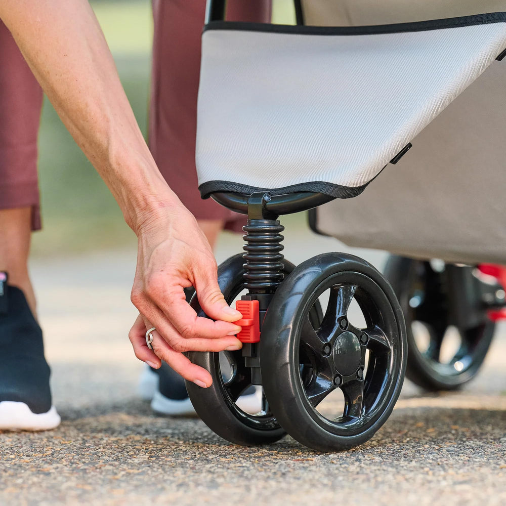 Carlson Pet Stroller umbrella and mesh canopy offering shade and airflow.