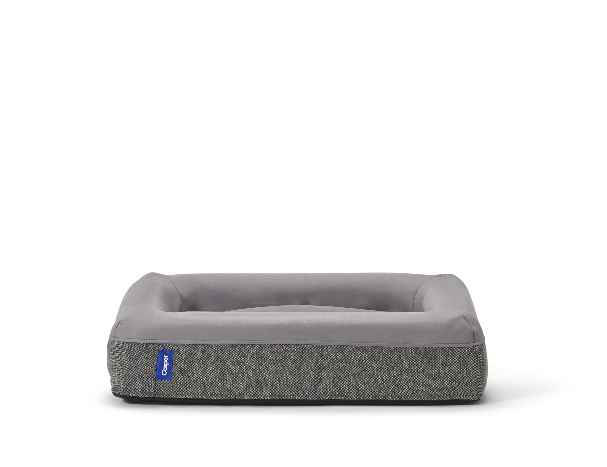 Casper dog bed foam bolsters provide a secure headrest.