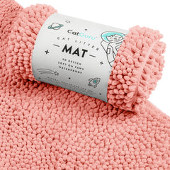 CatGuru Litter Mat XL coral with 3D design traps litter and protects floors.