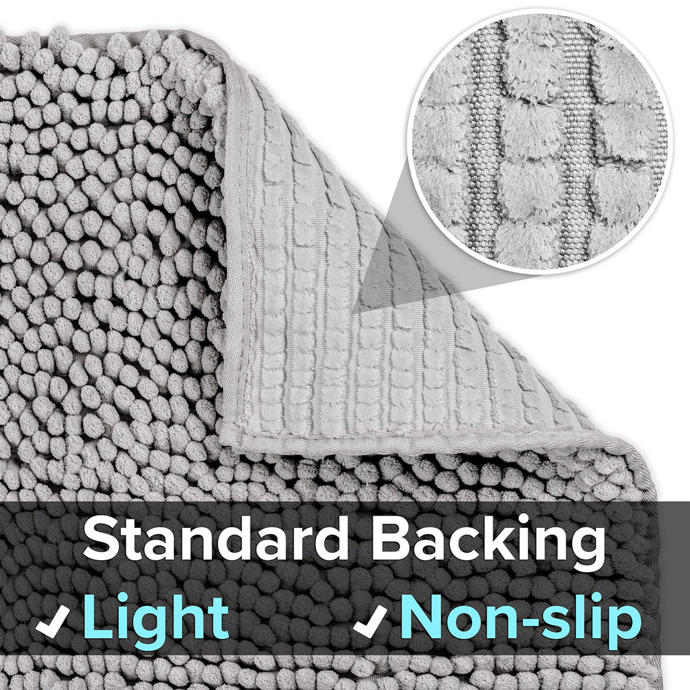 CatGuru XXL grey mat folded for easy cleaning and shaking.