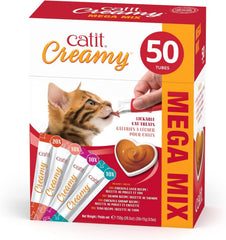 Catit Creamy lickable treat tube for interactive hand-feeding and bonding.