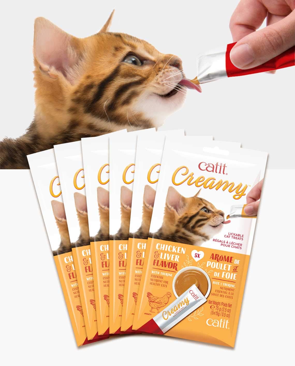 Catit Creamy Salmon cat enjoying the lickable treat reward