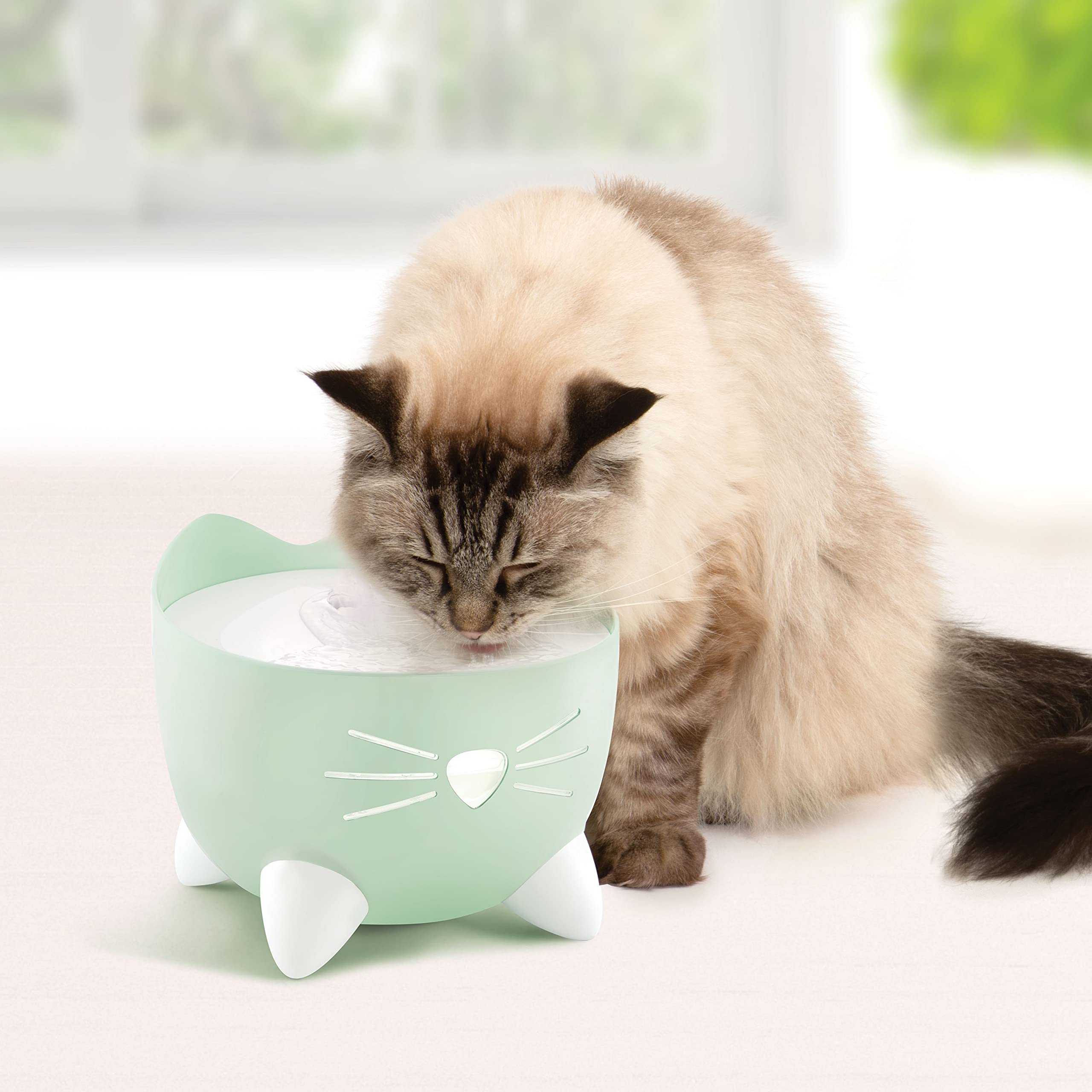 Catit PIXI triple-filter system cleans water for clearer taste.