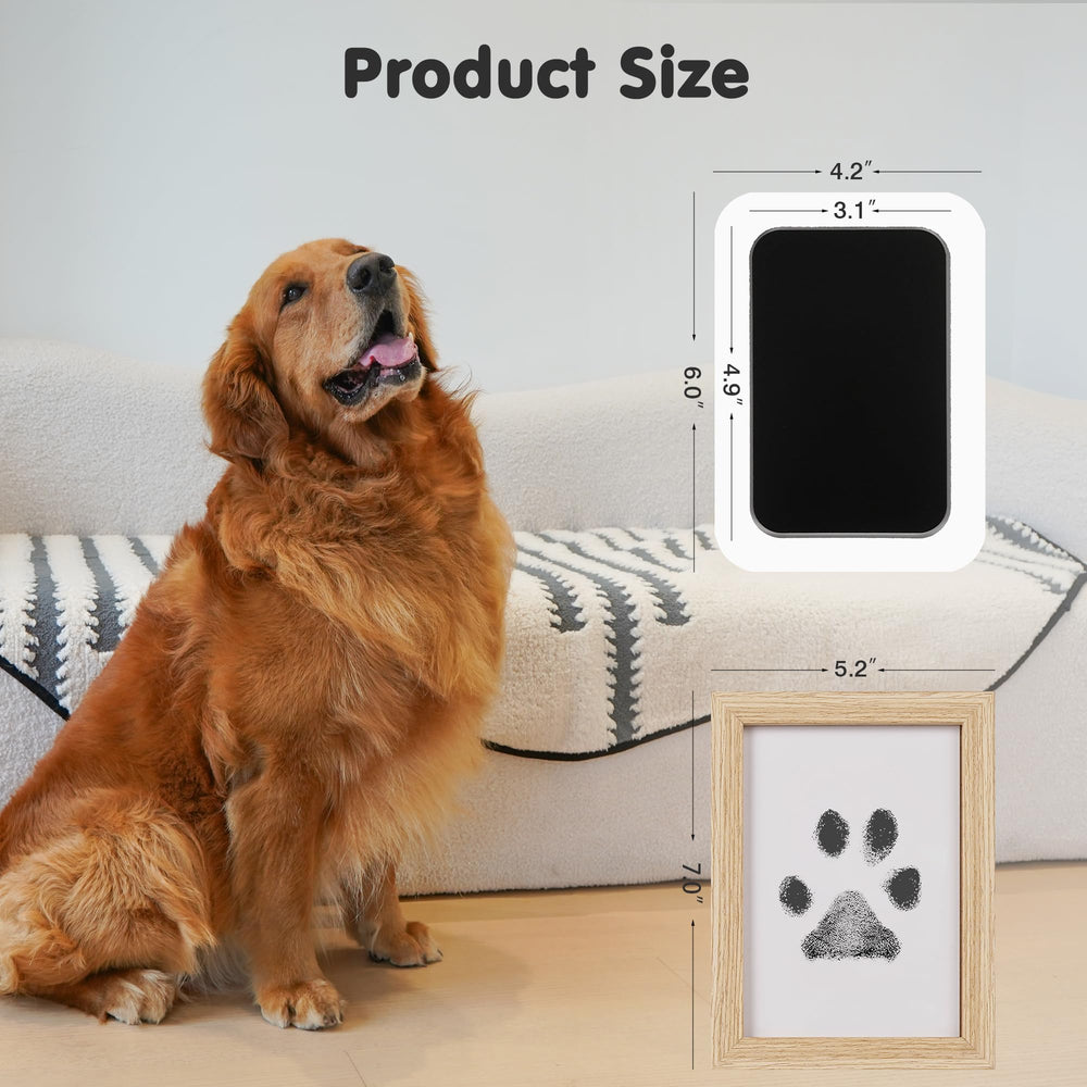 Two wooden frames showcase finished paw and handprints
