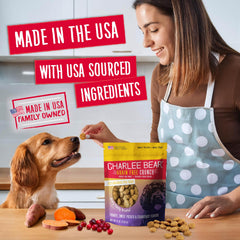 Charlee Bear puppy enjoys a treat, showing low-calorie rewards.