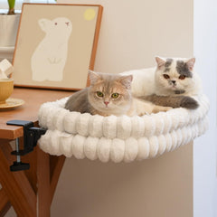 CHEERPALS cat desk bed foldable hammock on white desk for convenient lounging.
