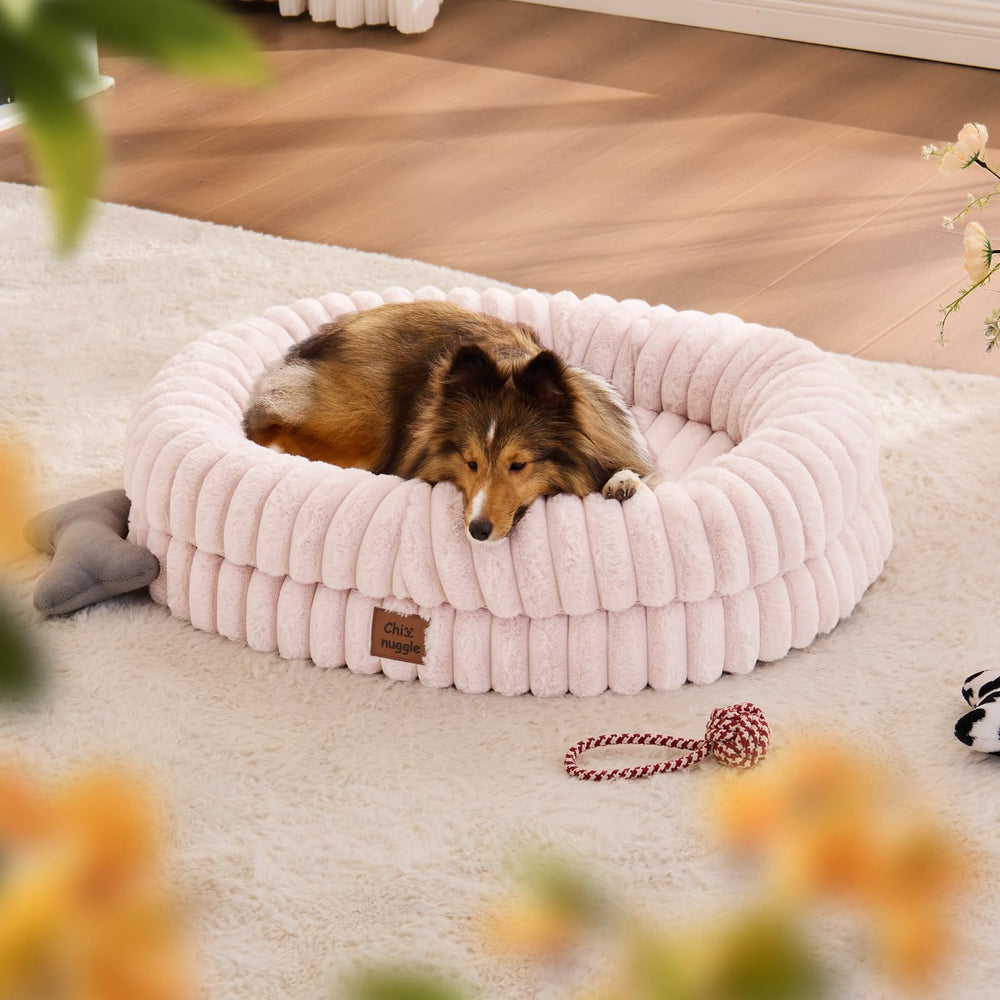 ChiXnuggle dog bed side view highlights bolster support for curling dogs