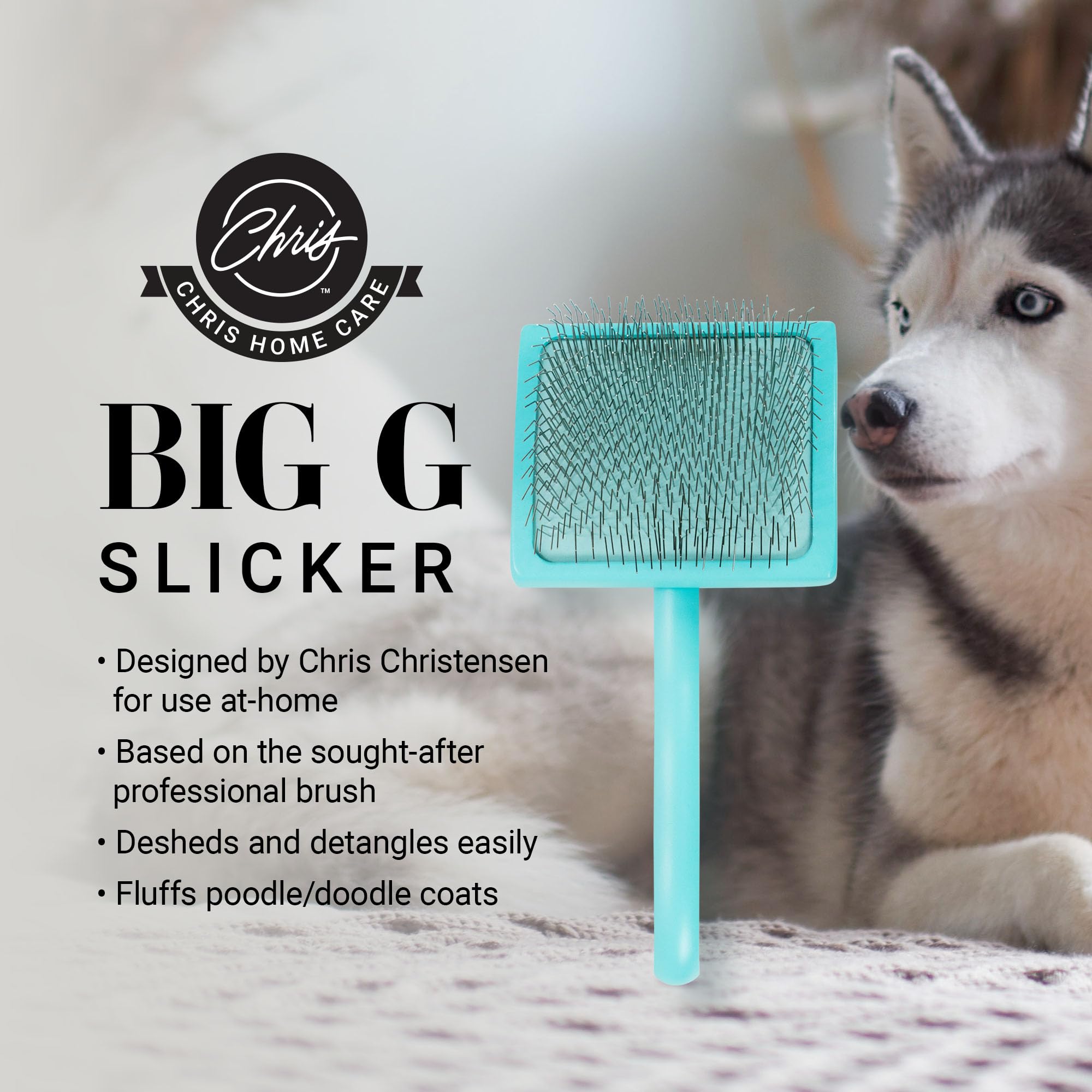 Teal Big G Slicker Brush large side view held for comfortable grooming