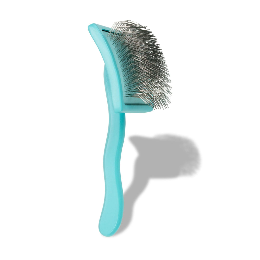 Limited edition teal packaging of Chris Christensen Big G Slicker Brush