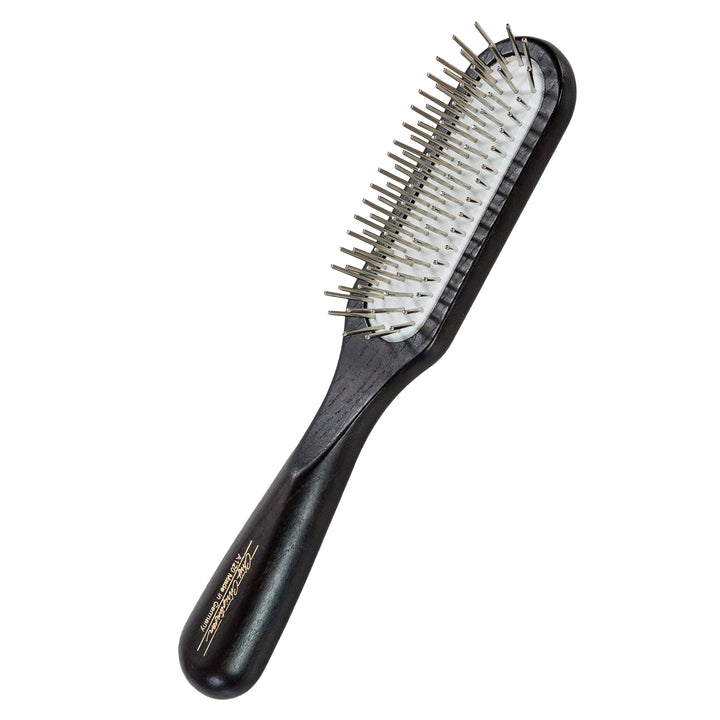 Chris Christensen Ice Slip Brush head glides smoothly for gentle detangling.