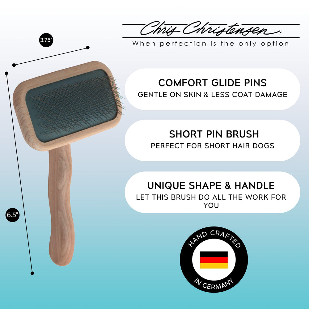 Chris Christensen Mark II Slicker Brush ergonomic handle supports comfortable grooming sessions.