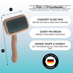 Chris Christensen Mark II Slicker Brush ergonomic handle supports comfortable grooming sessions.