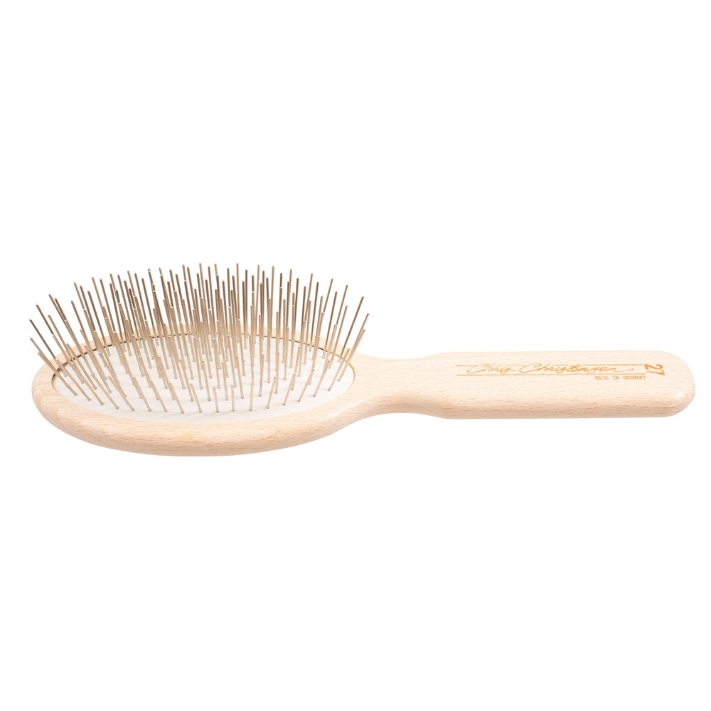 Pocket-sized brush for quick touch-ups during shows and travel.